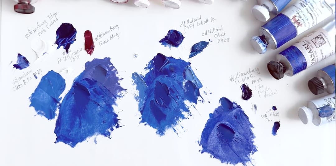 Three mixes compare a mix to the genuine paint. The mixes are labeled A, B, and C. There is also a tube of genuine YInMn Blue by Williamsburg