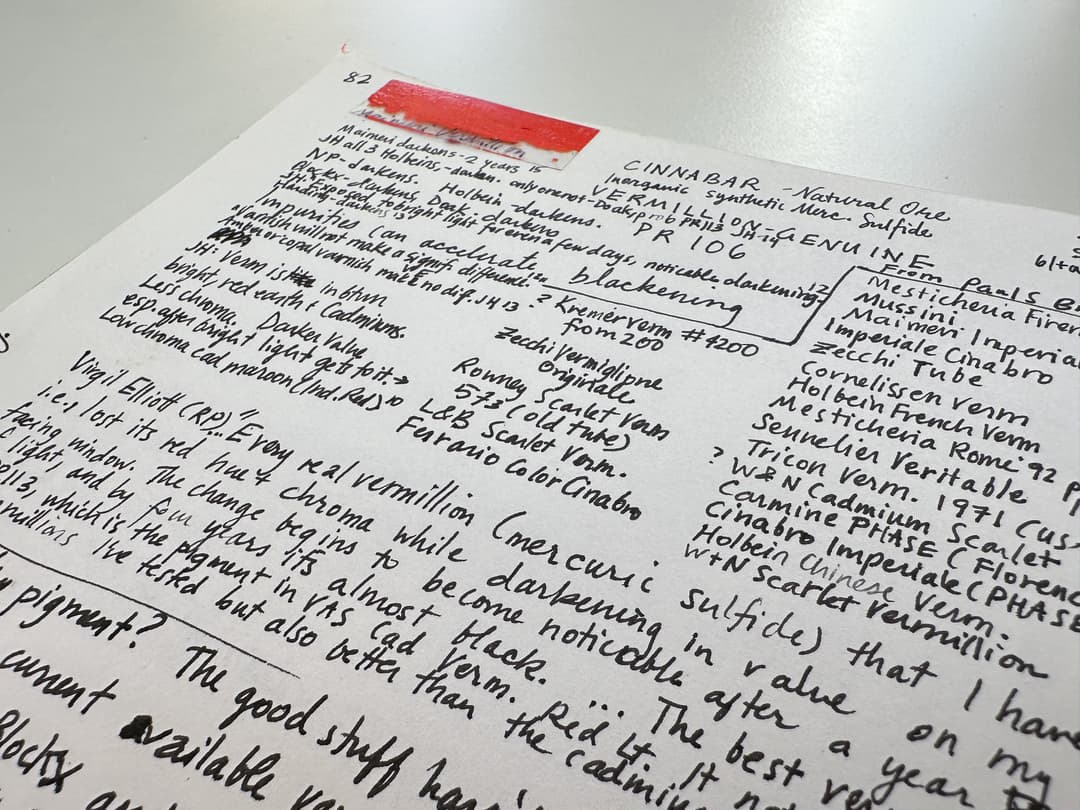 A page of handwritten text with a paint swatch from the Great Book of Color