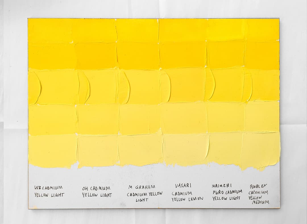 A panel showing paint swatches of cadmium yellow light in six different brands. The paints are mixed with varying levels of white.