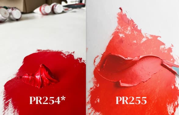 A daub of pyrrole red compared with a swish of pyrrole scarlet.
