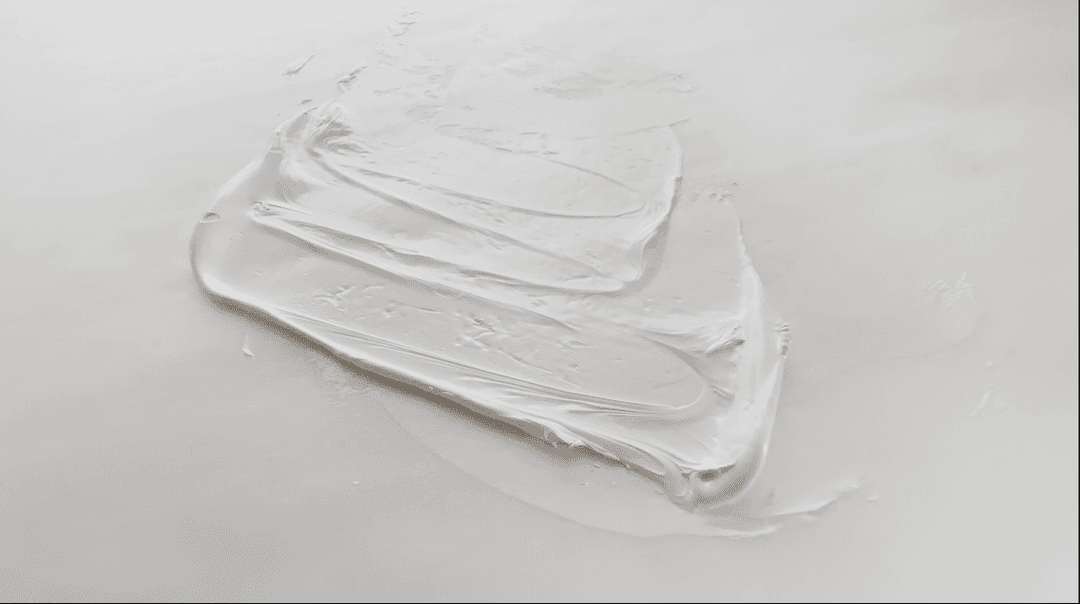 A swatch of titanium dioxide white oil paint by Michael Harding bound in Safflower Oil