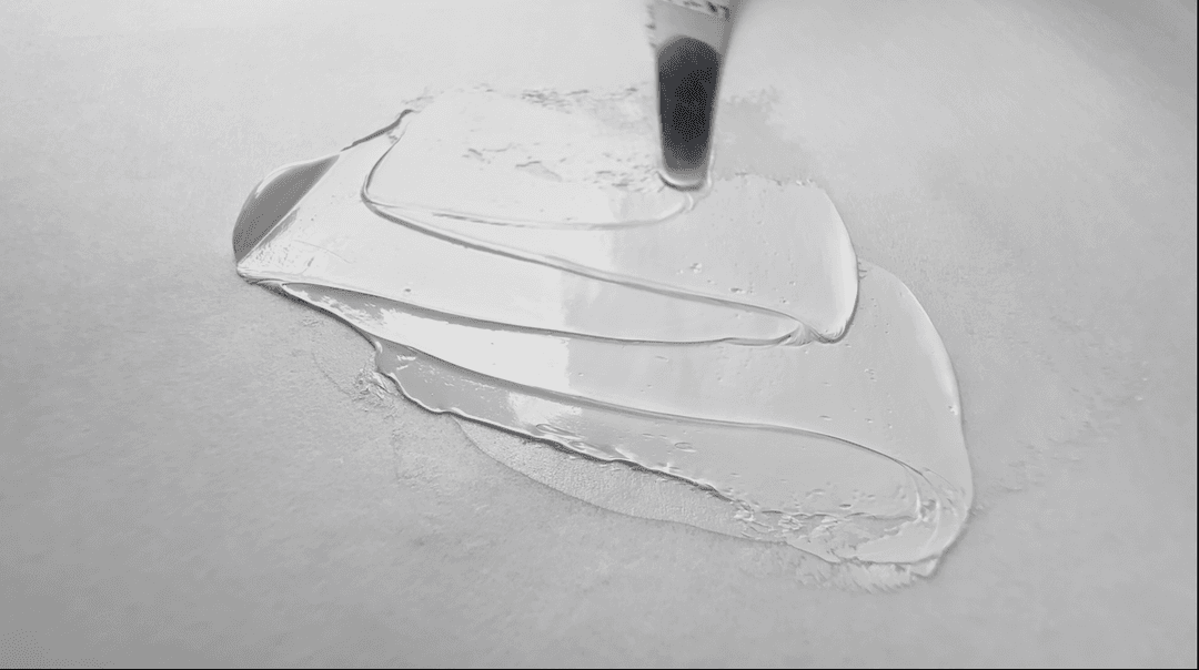 A swoosh of Old Holland Titanium White oil paint.