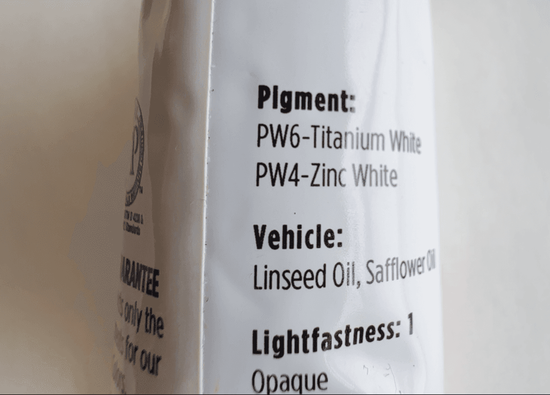 Utrecht's Titanium White is one of many which include Zinc Oxide, PW4, which is listed on the back. The back of the paint tube shows PW6 and PW4